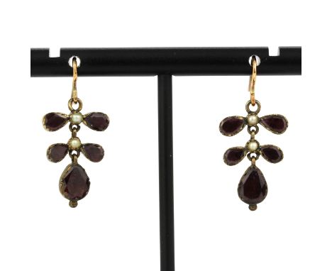 A pair of 9ct gold and silver garnet and seed pearl drop earrings, L. 2.8cm.