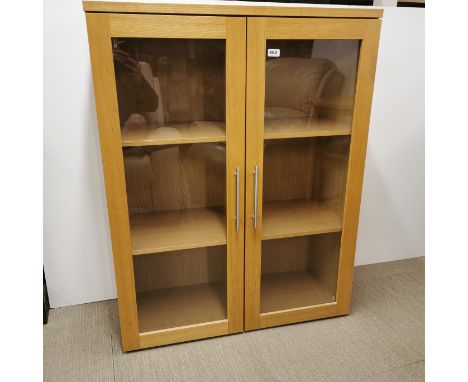 A light oak veneered display cabinet without base, 116 x 90 x 36cm.