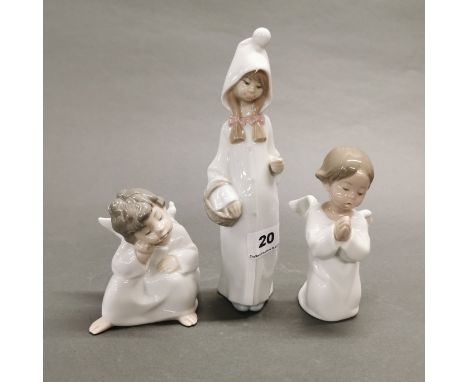 A group of three Lladro figures of children, two angels. Tallest figure missing staff, H. 22cm.