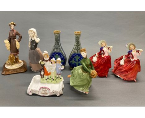 A group of Royal Doulton and others figures, with a pair of stoneware vases (one A/F to rim). Tallest H. 27cm.