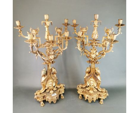 A pair of large impressive gilt bronze candelabra, H. 75cm.