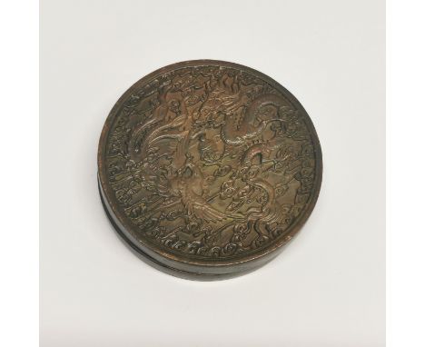 A very detailed Chinese cast bronze ink box, dia. 7cm.