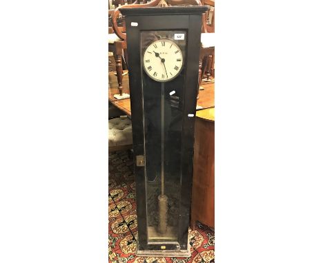 A British Rail Western region electric wall clock with Pul-syn-etic movement, the circular dial with Roman numerals to the ch