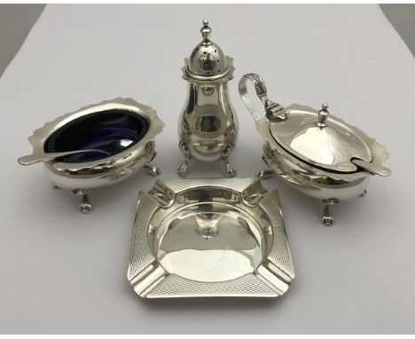 A modern silver three piece cruet (Birmingham 1979), together with an ashtray (Birmingham 1979), approx 5 oz