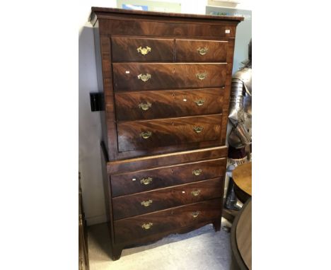 A 19th Century mahogany chest on chest, the upper section of two short over three long drawers on a base of three long drawer