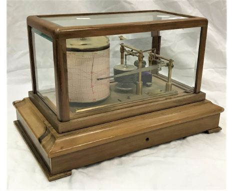 An early 20th Century barograph in the manner of Negretti &amp; Zambra, the drawer containing sheets for Negretti &amp; Zambr