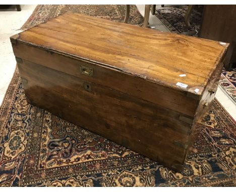 A 19th Century camphorwood and brass bound trunk 