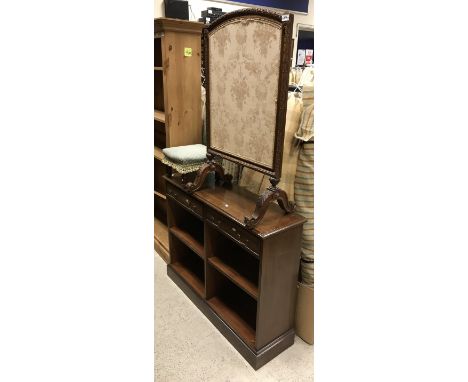 A carved mahogany framed firescreen, a modern mahogany side cabinet of two drawers over adjustable shelving and a footstool