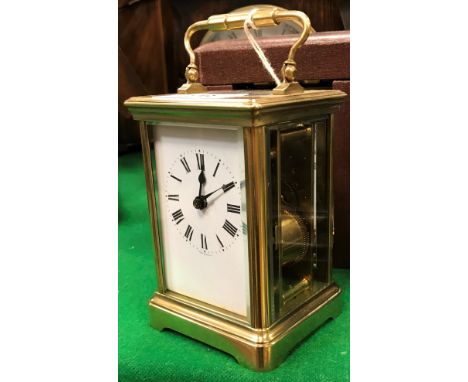 A circa 1900 brass cased carriage clock, the dial with Roman numerals