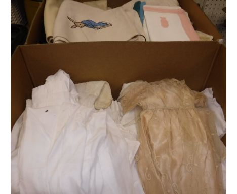 Two boxes of vintage textiles relating to babies and young children to include Christening gowns, nightdresses, nursery table