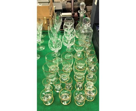 A set of five Stuart Crystal hock glasses, four Stuart Crystal champagne flutes, matching decanter (boxed) together with an A