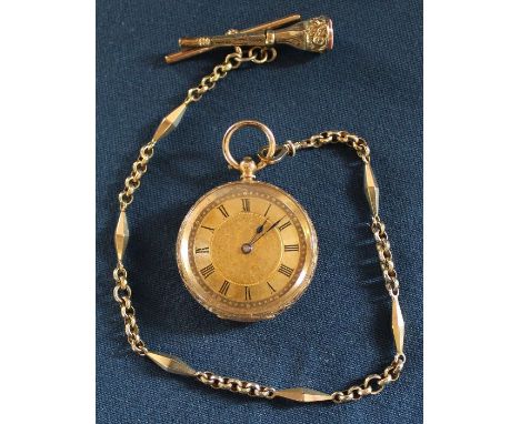 14ct gold open face key wind fob watch with engine turned face &amp; case and T bar chain &amp; key fob engraved E A Clarke t