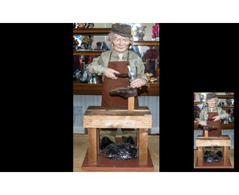 Advertising Automaton Interest Shop Display Mechanical Figure Mid 20th Century animated display model in the form of a Cobble