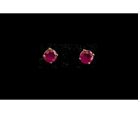 Ruby Stud Earrings, each a round cut solitaire ruby of good colour, set in 14ct gold vermeil and silver, with central post an