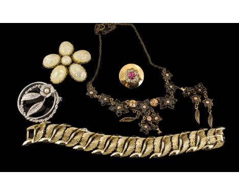 Collection of Vintage Designer Jewellery, comprising: Coro gold-tone brooch with central pink stone surrounded by rhinestones