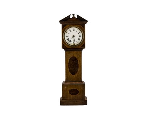 A Novelty Edwardian Mahogany Clock in the form of a long case clock, white enamel dial, Roman numerals, with inlaid banding t