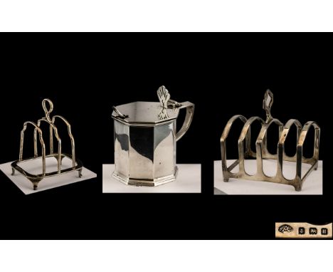 A Collection of Silver to include two toast racks, one five bar hallmarked for Birmingham 1932 and a three bar marked for Lon