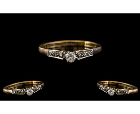 18ct Yellow Gold Single Stone Diamond Set Ring with Diamond Set Shoulders, Hallmark to Shank Interior. The Round Diamond of G