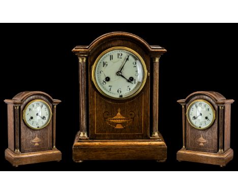 An Early 20th Century Oak Cased Mantel Clock with Hamburg American Clock Company Movement. Domed top with reeded columns. Hei