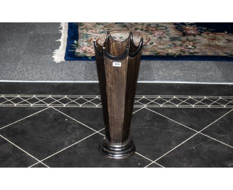 A Stained Wood Faceted Floor Standing Stick Stand missing three terminals on a circular base. Height 25 inches.