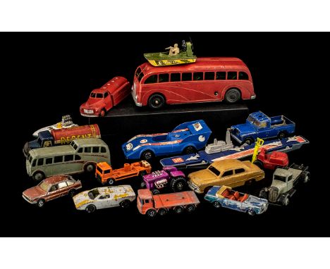 A Collection of Dinky Cars to include K-304 Aircraft Carrier, a red petrol truck, a red school bus, Ford sedan, Ergomatic cab