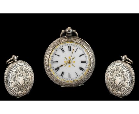 French Silver Fob Watch with a White Enamel Dial with Gilt Edge Border In a Double Engraved Case. 