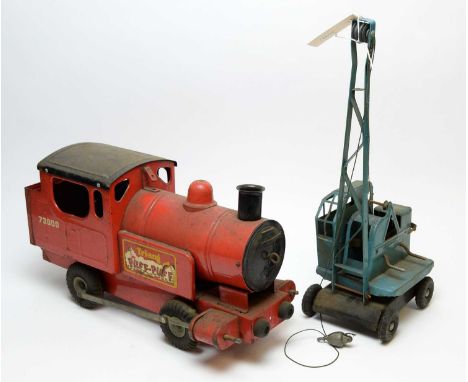 A Tri-ang Puff-Puff tin plate model train, painted in red and black; together with a Tri-Ang tin plate Jones KL44 model train