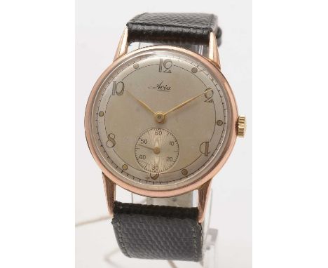 A 1961 9ct gold cased Avia wristwatch, with manual-wind movement, Arabic numerals, and subsidiary seconds dial, 32.9g gross. 