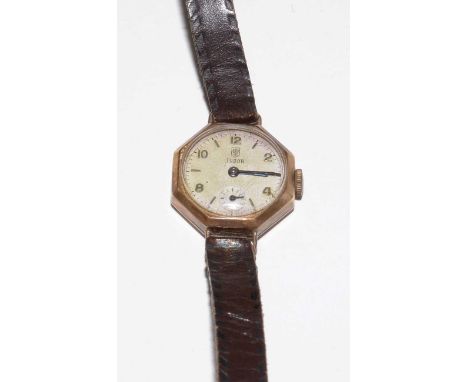 A lady's 9ct gold cased Tudor wristwatch, with manual-wind movement, silvered face, Arabic and baton markers, and a subsidiar