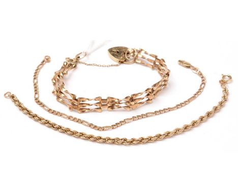 Three 9ct gold and yellow-metal bracelets, including a gate-link bracelet with heart-shaped padlock clasp, 11.6g gross