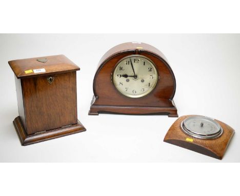 A Victorian mahogany stationary box, with hinged top and drop front, 24cms high; together with an oak wall barometer; and a m