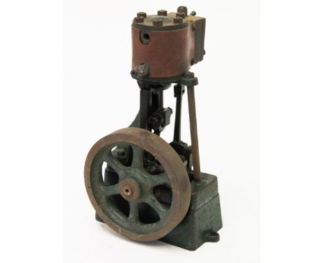 A model stationary steam engine. H15cm. Condition - wear to metal, no damage.