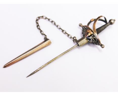 A white metal stick pin in the form of a rapier. L6.8cm. Wt. 3g