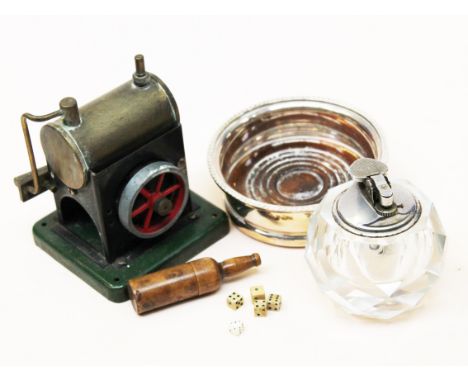 A mixed lot comprising a treen bottle containing dice, a model steam engine, a lighter and an EPNS coaster. Condition - engin