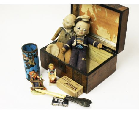 A Victorian walnut box and contents to include two Norah Wellings dolls, a cloisonne vase, two hummel figures, a hallmarked s