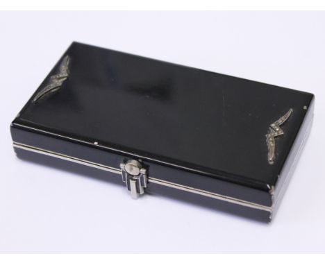 An Art Deco chrome and black compact. L10.5cm