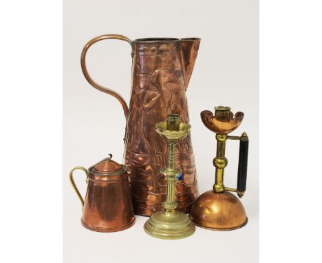 Four pieces of metal wear comprising a Newlyn style jug (base replaced), a Benson hot water jug, a brass candle stick with co