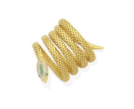 EMERALD AND DIAMOND SERPENT BRACELETThe sprung coiled body of scale-like design, with rectangular cushion-shaped emeralds and