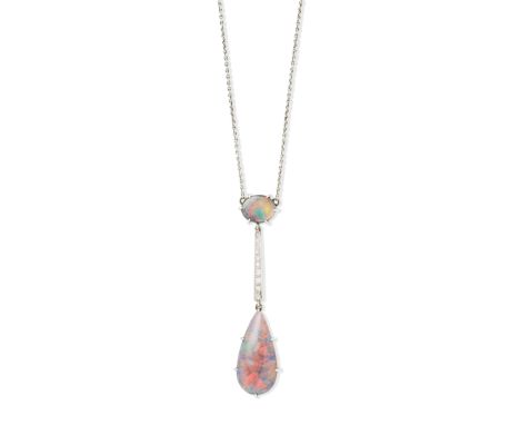 BLACK OPAL AND DIAMOND PENDANT NECKLACE, CIRCA 1905Black opal cabochons, graduating single-cut diamonds, on a fine-link chain