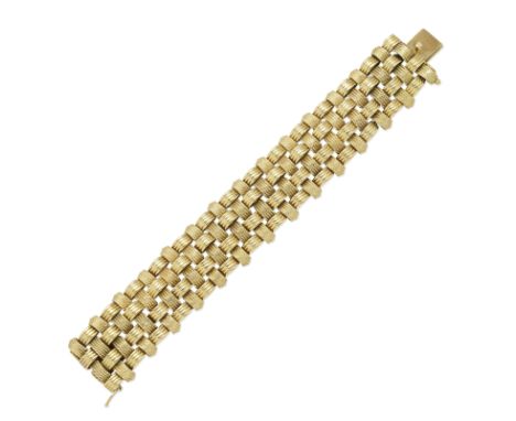 BOUCHERON: FANCY-LINK BRACELET, MID 20TH CENTURYThe flexible strap designed as a lattice of fluted and textured links,  signe