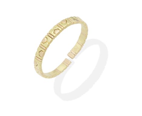 BULGARI: FANCY-LINK SPRUNG BANGLEDesigned as a series of vari-coloured architectural motifs, signed Bulgari, numbered BA 1204