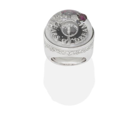DREAMBOULE: DIAMOND AND RUBY 'BENTLEY 100 CELEBRATION' RINGThe clear liquid-filled dome containing the words 100 YEARS OF DRE