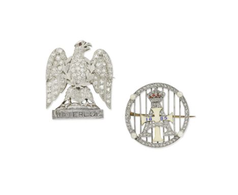 TWO DIAMOND-SET REGIMENTAL BROOCHES1st: A 2nd Dragoons (Royal Scots Greys) eagle brooch set with single-cut diamonds, the eye