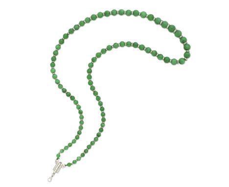 ART DECO JADE AND DIAMOND NECKLACE, CIRCA 1925Composed of eighty-four jade beads, graduating in size towards the centre, acce