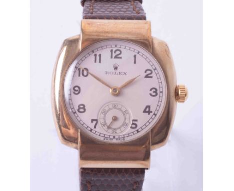 Rolex, a 9ct cushion cased wristwatch, the dial with Arabic numerals and sub seconds, manual wind.