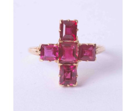 An antique ruby 'cruciform' five stone ring of good colour, circa 1900, size I.