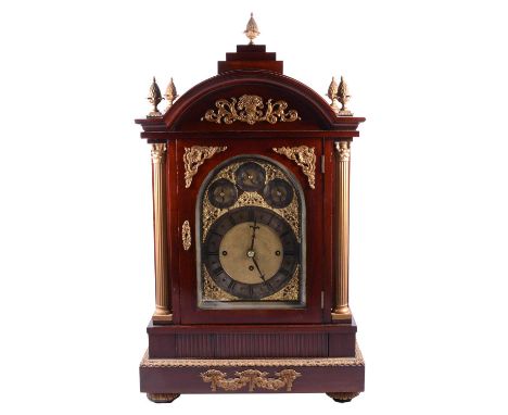 Edwardian mahogany and gilt metal mounted triple fusee bracket clock, the case with pineapple finials, arched hood, Corinthia