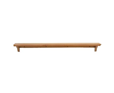 Robert 'Mouseman' Thompson of Kilburn, an oak wall shelf, with shaped brackets, carved to one end with signature mouse, lengt