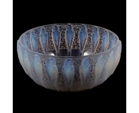René Lalique, 'Perruches' an opalescent glass bowl, design introduced 1931, moulded in relief with twenty parakeets, acid etc