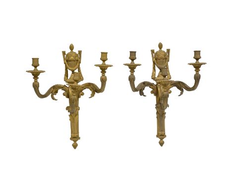 Large pair of gilt bronze triple-light wall appliques, cast with scrolled acanthus leaf arms, the column surmounted with a Cl